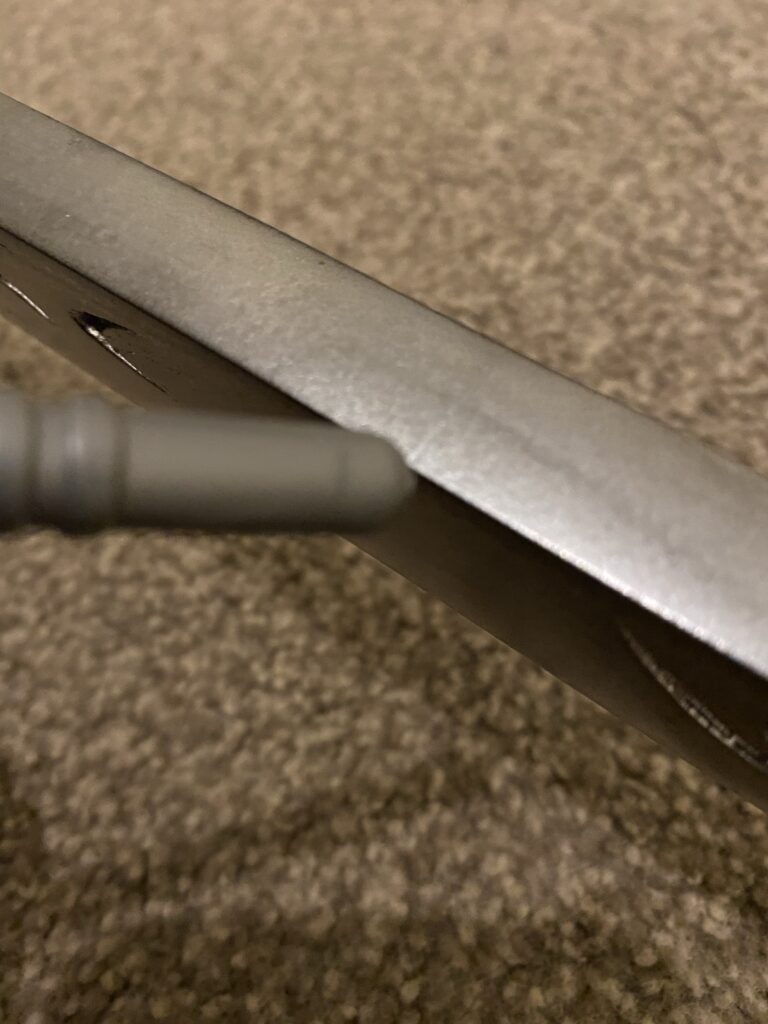 Back of the blade has a stick pointing at the smallest of imperfections.