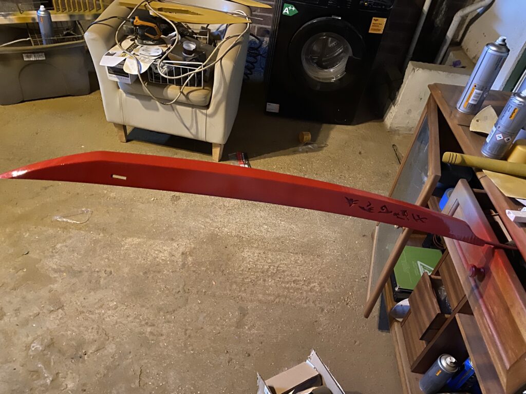 A single flat red colour has been applied to the base.