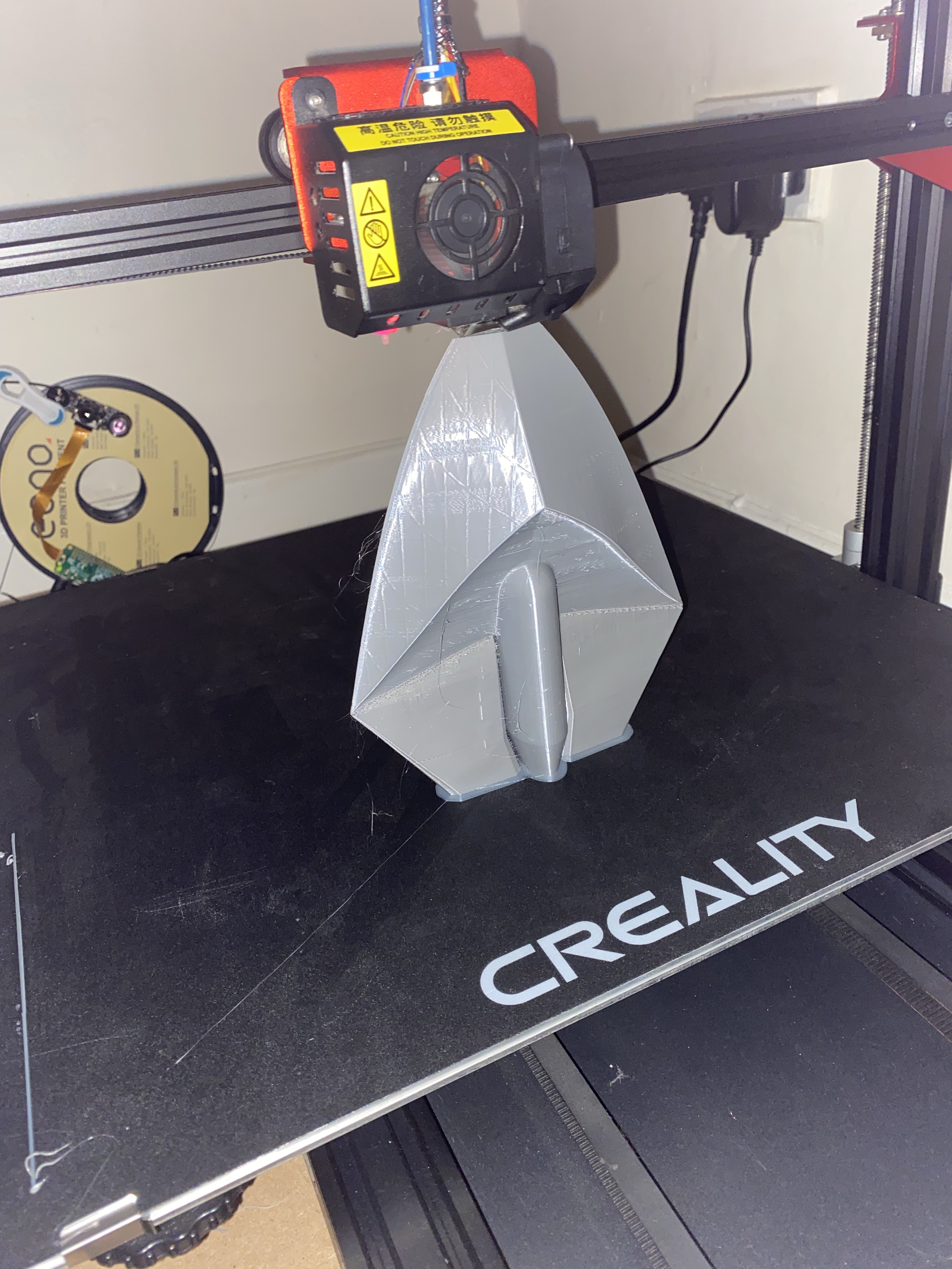 Arrowhead on the printer.