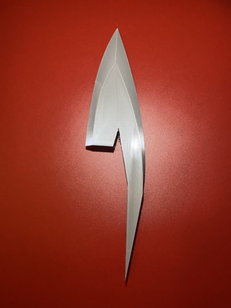 Tidus Longsword Component in grewy PLA with a red background: Blade 2