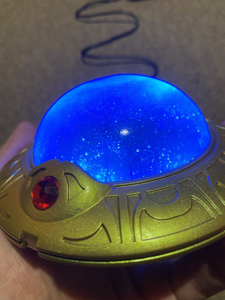 Close up of the Jecht Sphere lit up