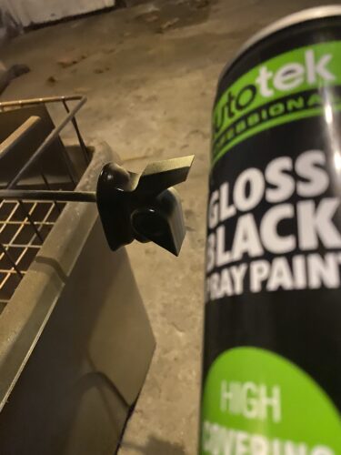 Up close of the gloss black spray painrt and the pommel.