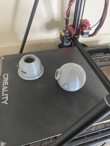 The stand and the body of the turret fresh of the printer in grey PLA.