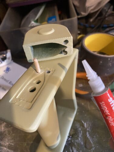 Handle and bladeguard being fused together with a piece of wooden dowel and super glue.