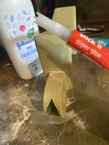 Super glue and talcom powder used for filling in the seam