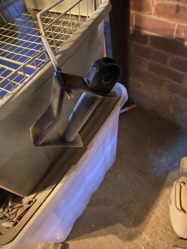 Handle getting it's first coat of Gloss Black.