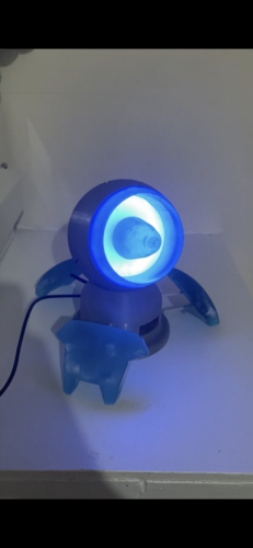 The parts are unfinished and unpainted, but they've been loosely assembled and the LEDs lit up.
