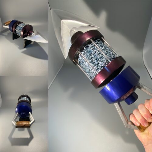 A collage of the finished Longshot,a rear view, side view and one where it is held up to the camera