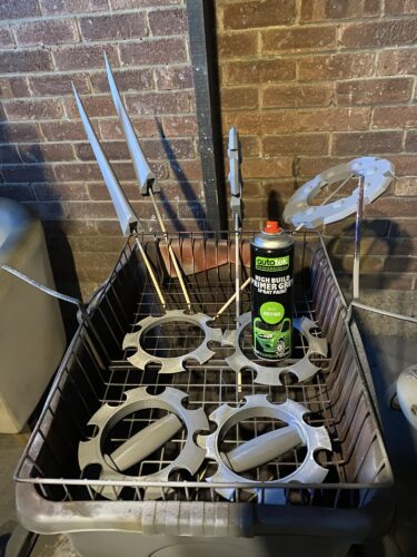 All parts of Rikku's Daggers post priming in grey filler primer.
