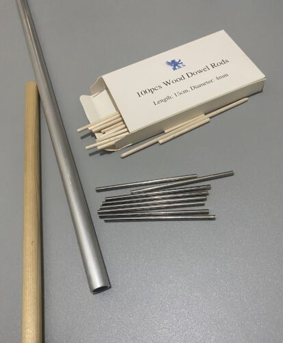 A variety of support rods, two large (one wooden and one meta) and a collection of 4mm support rods, again wooden and meta.