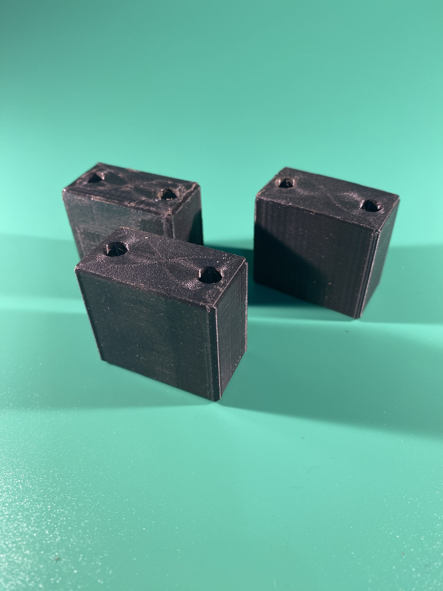 The links between blades. Part of the Raw Build Kit for the Razor Sword from Zelda Majora's Mask, printed in black PLA on a green background.